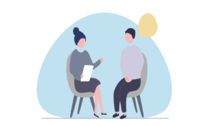 Two people having a conversation in a casual setting.