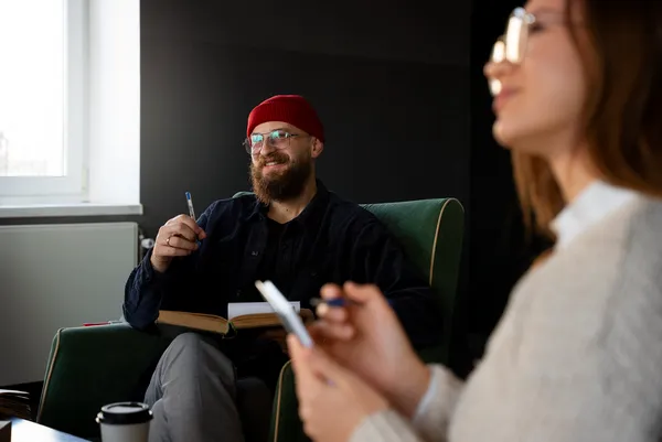 Side view of people on a talk session